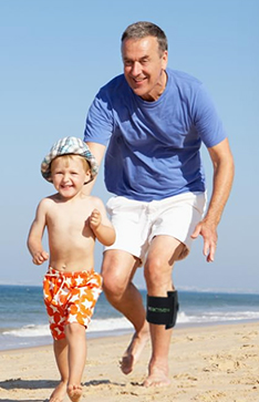 Man and kid on the beach